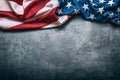 USA flag. American flag. American flag freely lying on concrete background. Close-up Studio shot. Toned Photo