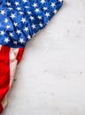 USA flag. American flag. Top of view American flag freely lying on white concrete background. Close-up Studio shot Royalty Free Stock Photo