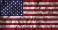 USA flag on crumpled recycle paper background Royalty Free Stock Photo