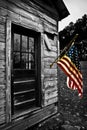 USA Flag Hangs From an Old Cabin Color Splash