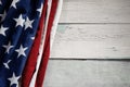 USA Flag Lying on Vintage Weathered Wooden Background. American Symbolic. 4th of July or Memorial Day of United States Royalty Free Stock Photo