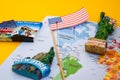 Usa flag and magnets from new york and san francisco over world map with pins Royalty Free Stock Photo