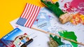 Usa flag and magnets from new york and san francisco over world map with pins Royalty Free Stock Photo