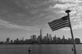USA flag. Memorial Day, Veteran's Day, 4th of July. American Flag Waving near New York City, Manhattan view Royalty Free Stock Photo