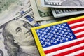 USA flag and money. Cash for VA loan from U.S. Department of Veterans Affairs