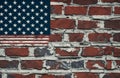 usa flag on the old grunge brick wall texture or background concept of 4th july Royalty Free Stock Photo