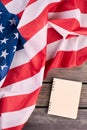 USA flag and opened notebook, top view. Royalty Free Stock Photo