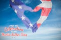 Composite image of usa flag painted on hands making heart shape