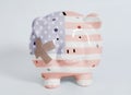 USA flag painted on Piggy bank with plaster Royalty Free Stock Photo