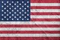USA flag on stone wall, grunge background. USA flag depicted in bright paint colors