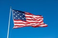 USA Flag Waving in Blue Background. American Wave Flag Royalty Free Stock Photo