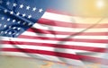 Usa flag waving in the wind, Flag of american country on sunset or sunrise Royalty Free Stock Photo