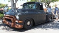 Vintage GMC truck still in restoration process, rusted bumper and paint missing clear coat