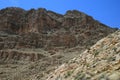 USA. Grey mountains Nevada and desert plant. Geological structure. Cliffs and rocks.