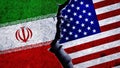 USA and Iran flag together on a cracked wall Royalty Free Stock Photo