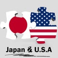USA and Japan flags in puzzle