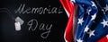 USA Memorial Day concept. American flag and dog tags on black background. Handwritten lettering on chalkboard