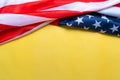 USA Memorial day and Independence day concept, United States of America flag on yellow background Royalty Free Stock Photo