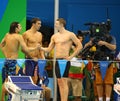 USA Men's 4x100m medley relay team Cory Miller (L), Michael Phelps and Ryan Murphy celebrate victory