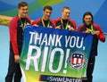 USA Men's 4x100m medley relay team Nathan Adrian(L), Michael Phelps, Ryan Murphy and Cory Miller celebrate victory