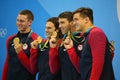 USA Men`s 4x100m medley relay team Ryan Murphy L, Cory Miller, Michael Phelps and Nathan Adrian celebrate victory