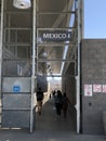 US - Mexican border in San Diego, CA. People walking through
