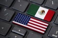 USA and Mexico flags on computer keyboard Royalty Free Stock Photo