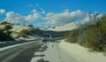 car rides the harms of sand dunes from gypsum to White Sands National Monument, New Mexico, USA