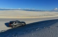 car rides the harms of sand dunes from gypsum to White Sands National Monument, New Mexico, USA