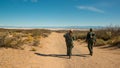 gypsum desert in New Mexico, rangers lead a group of tourists to a dry Lucero lake in a valley near the mountains in New Mexico Royalty Free Stock Photo