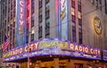 New York, Broadway streets at night. Radio city entrance, colorful neon lights Royalty Free Stock Photo