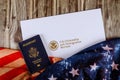 USA passport and naturalization certificate of citizenship US flag over wooden background