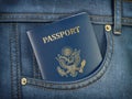 USA passport in pocket jeans. Travel, tourism, emigration and passport control concept