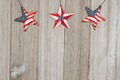 USA patriotic old flag on a stars and weathered wood background Royalty Free Stock Photo