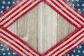USA patriotic old flag on a weathered wood background Royalty Free Stock Photo