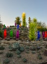 USA, PHENIX, ARIZONA- NOVEMBER 17, 2019: multi-colored plastic animal figures among cacti of different species in the botanical Royalty Free Stock Photo