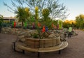 USA, PHOENIX, ARIZONA- NOVEMBER 17, 2019:  multi-colored plastic animal figures among cacti of different species in the botanical Royalty Free Stock Photo