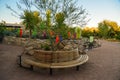 USA, PHOENIX, ARIZONA- NOVEMBER 17, 2019:  multi-colored plastic animal figures among cacti of different species in the botanical Royalty Free Stock Photo