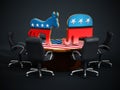 USA Political party symbols standing on American flag covered table Royalty Free Stock Photo