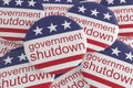 News Badges: Pile of Government Shutdown Buttons With US Flag 3d illustration Royalty Free Stock Photo