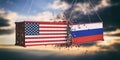 USA and Russia trade war. US of America and Russian flags crashed containers on sky at sunset background. 3d illustration