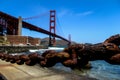 USA San Francisco June 2018: Photo of the attractions of the Golden Gate Bridge near the water with waves and chain