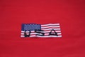 USA spelled out with toy guns on top of a USA flag Royalty Free Stock Photo