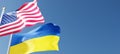 USA and Ukraine flags waving in the wind against a blue sky mockup with copy space. national symbols of the united states of