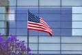 USA United States American flag in front of skyscraper in Mexico Royalty Free Stock Photo