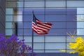 USA United States American flag in front of skyscraper in Mexico Royalty Free Stock Photo