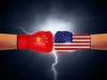USA vs China concept. America and China hand boxing gloves fight concept. Royalty Free Stock Photo