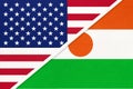 USA vs Niger national flag from textile. Relationship between two american and african countries