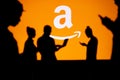 USA, WASHINGTON, JANUARY 30, 2023: Amazon. Web Development Dreams Come True: Silhouetted Developers in Discussion with Company Royalty Free Stock Photo