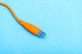 USB Cable Plug isolated on Blue Background Royalty Free Stock Photo